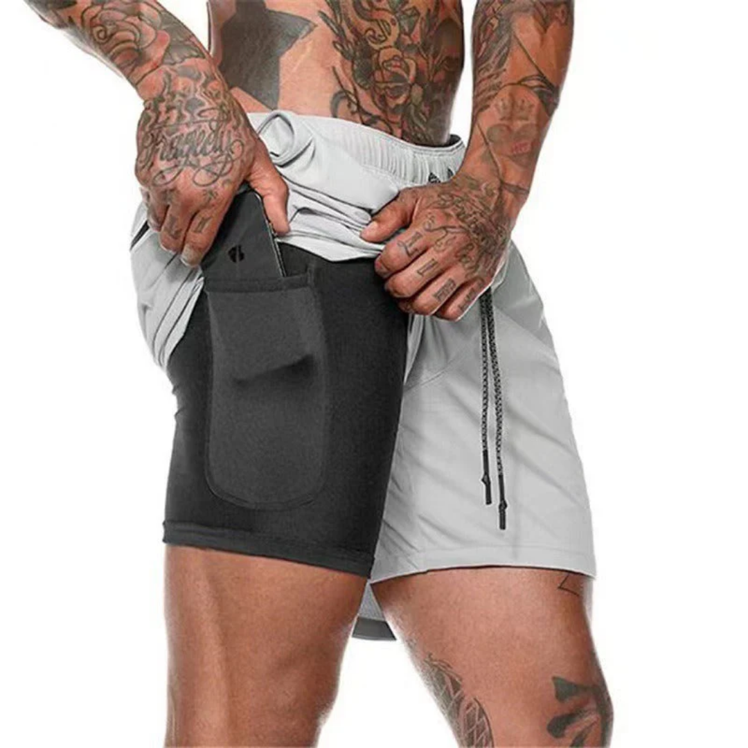 Veyra - 2-i-1 treningsshorts med sprettfri mobil­lomme.