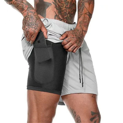 Veyra - 2-i-1 treningsshorts med sprettfri mobil­lomme.